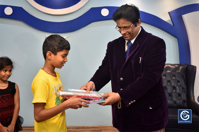 About Ten Poor and needy Students from Various Schools and Colleges of Mangalore brightened up as they received books, umbrellas and Education Scholarship from Grace Ministry on Sunday, June 16th, 2019. 